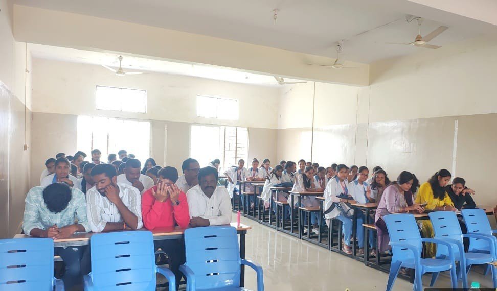 Students gathered in a college classroom